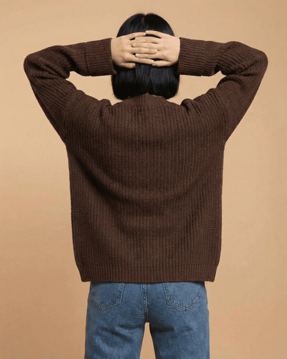 Back view of a model wearing the Cocoa Cardigan by Slimona, showcasing the relaxed fit and knit texture.