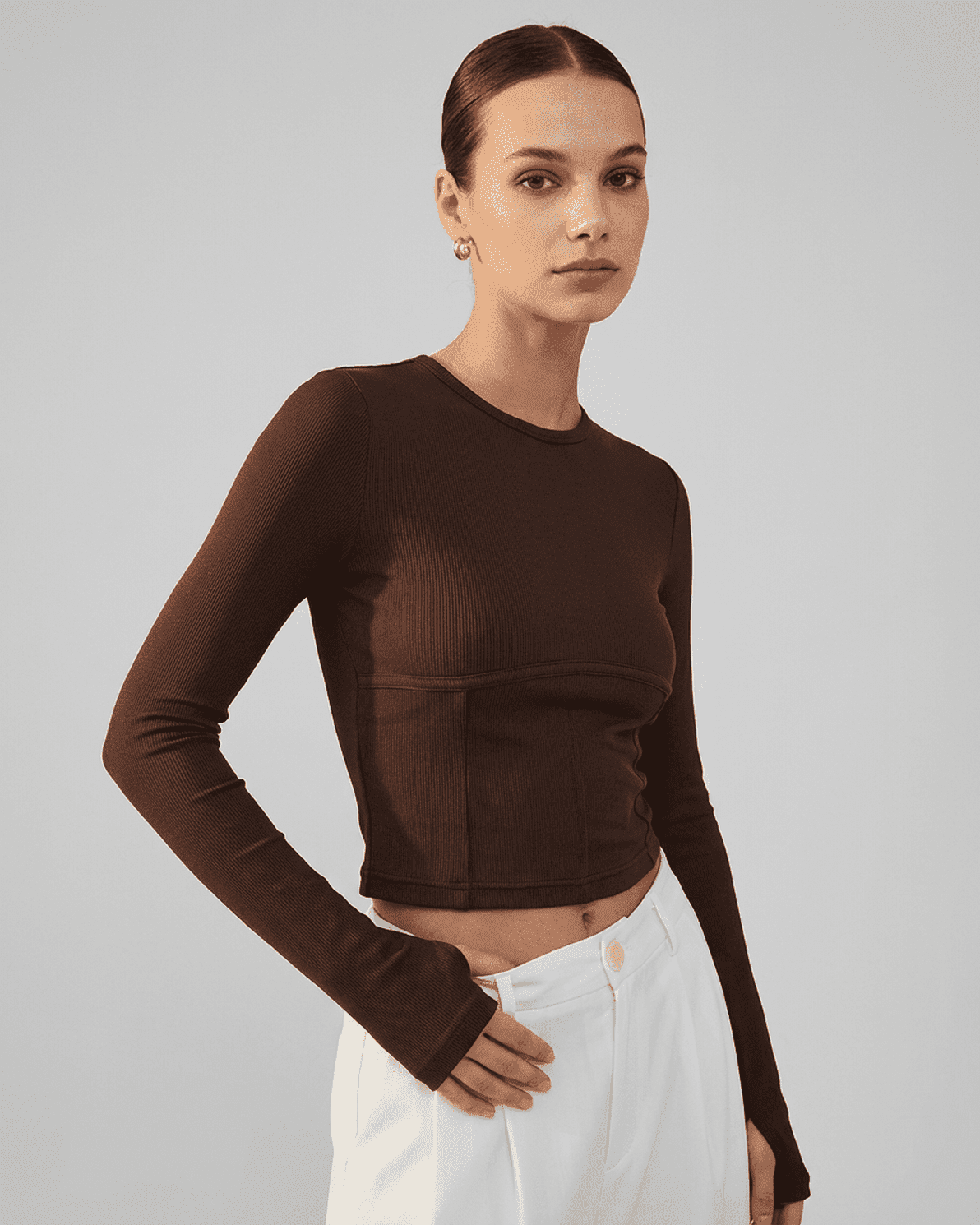 Cocoa Corset Top by Slimona featuring a long sleeve jersey design in brown, perfect for refined styling.