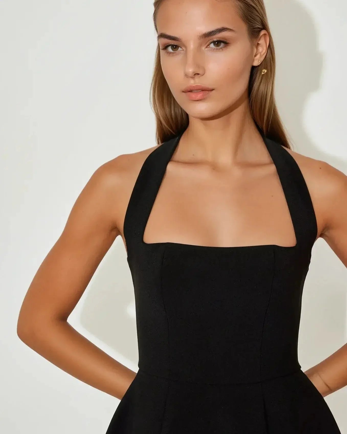 Elegant black halter neckline mini dress for women, perfect for weddings, parties, or formal occasions.