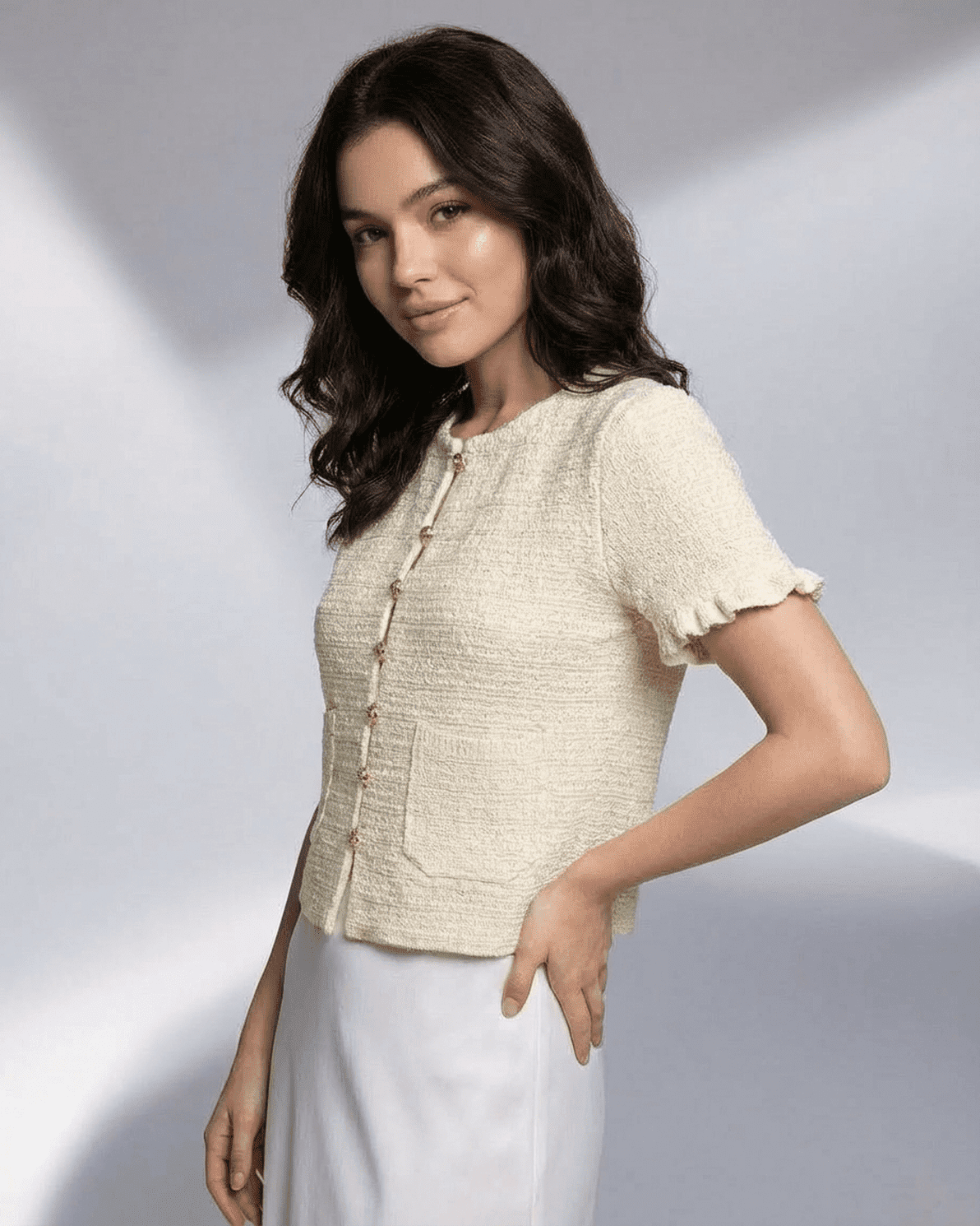 Elara Cardigan by Slimona in lightweight knit, featuring short sleeves and button closure for stylish layering.