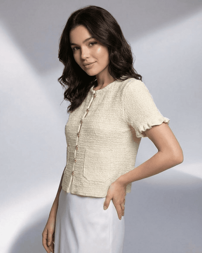 Elara Cardigan by Slimona in lightweight knit, featuring short sleeves and button closure for stylish layering.