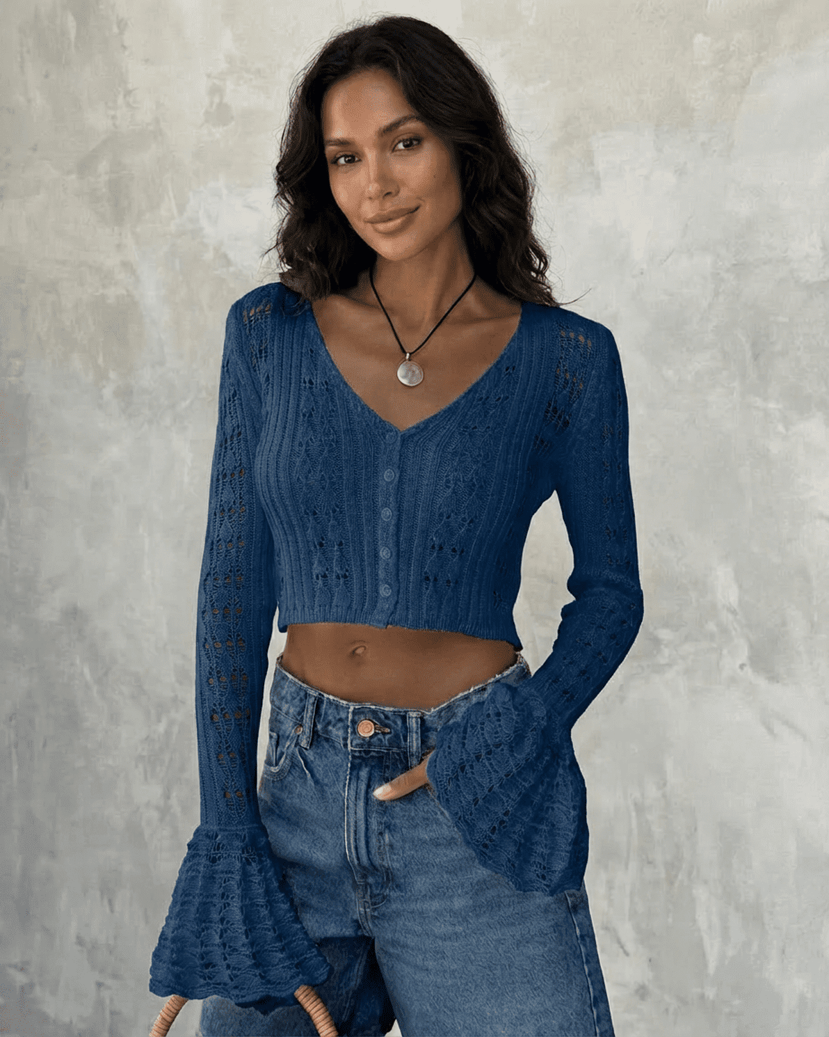 Indigo Cardigan by Slimona, cropped cotton knit with flare sleeves and hollow-out detailing.