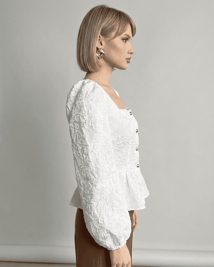 Ivory Corset Top by Slimona, featuring jacquard fabric and puff sleeves, showcasing a refined and elegant look.