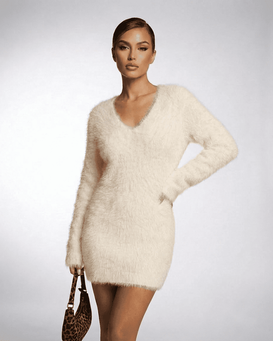 Ivory Sweater by Slimona featuring a V-neck fuzzy plush knit design and a loose fit silhouette.