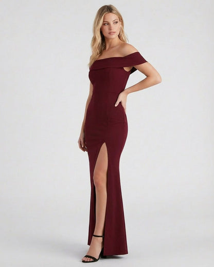 Kate Maxi Dress by Slimona in maroon, featuring an elegant off-the-shoulder design and thigh-high slit.