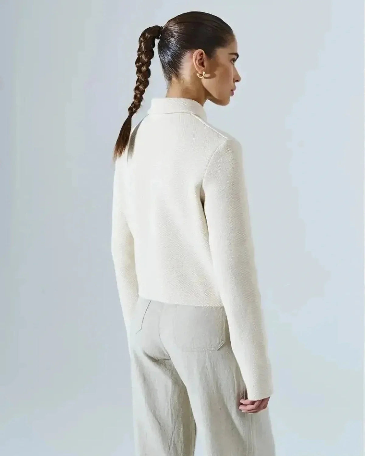 Lazio Cropped Jacket by Slimona, elegant cream jacket viewed from the back, showcasing its chic design and tailored silhouette.