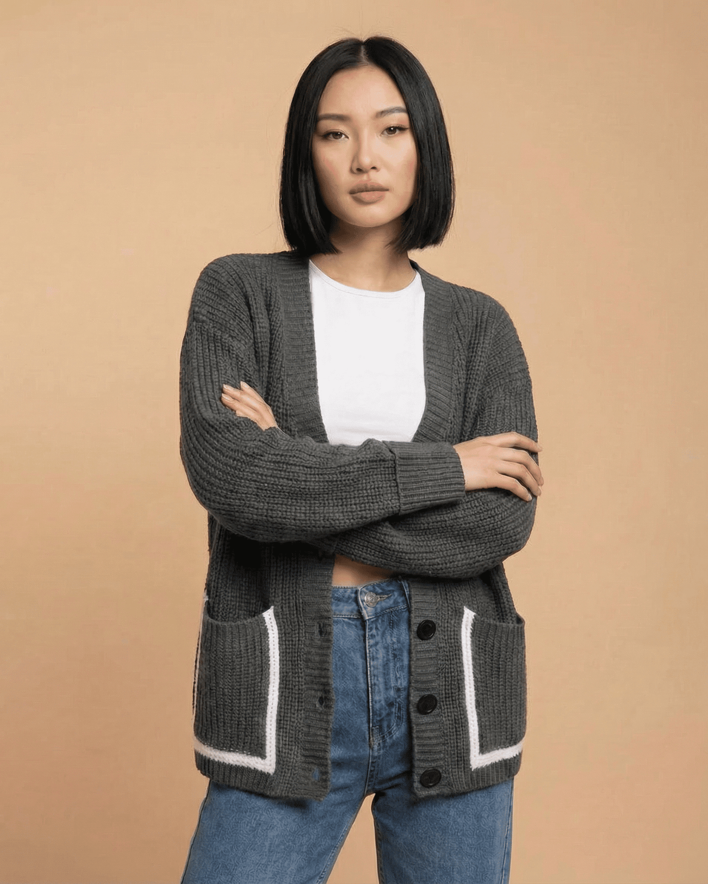 Linden Cardigan by Slimona, a relaxed V-neck color block knit sweater for modern women.