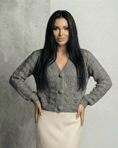 Luna Cardigan by Slimona, lace knit V-neck button front cardigan in gray worn by a model, showcasing its elegant design.