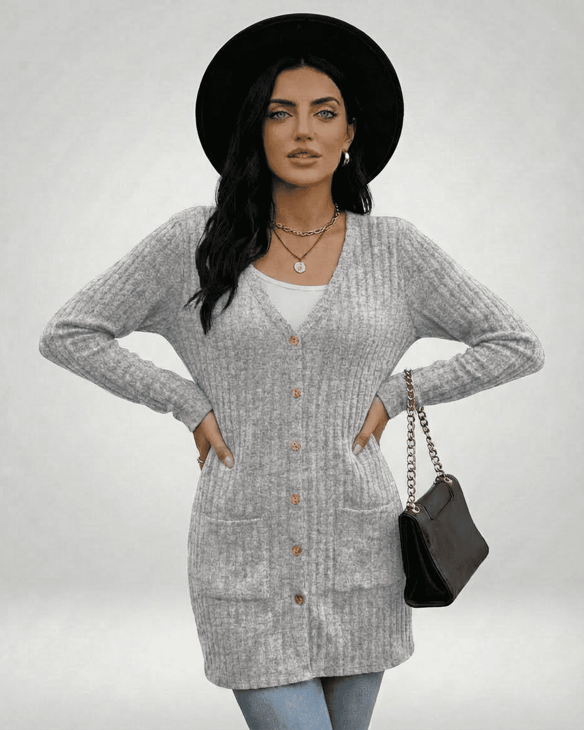 Luna Cardigan by Slimona, a longline button-front cardigan with a ribbed texture and a classic V-neckline.