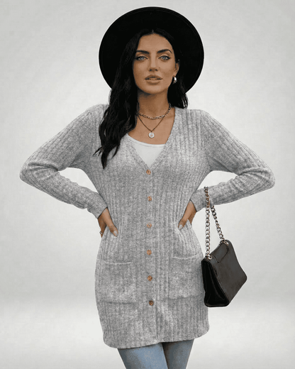 Luna Cardigan by Slimona, a longline button-front cardigan with a ribbed texture and a classic V-neckline.