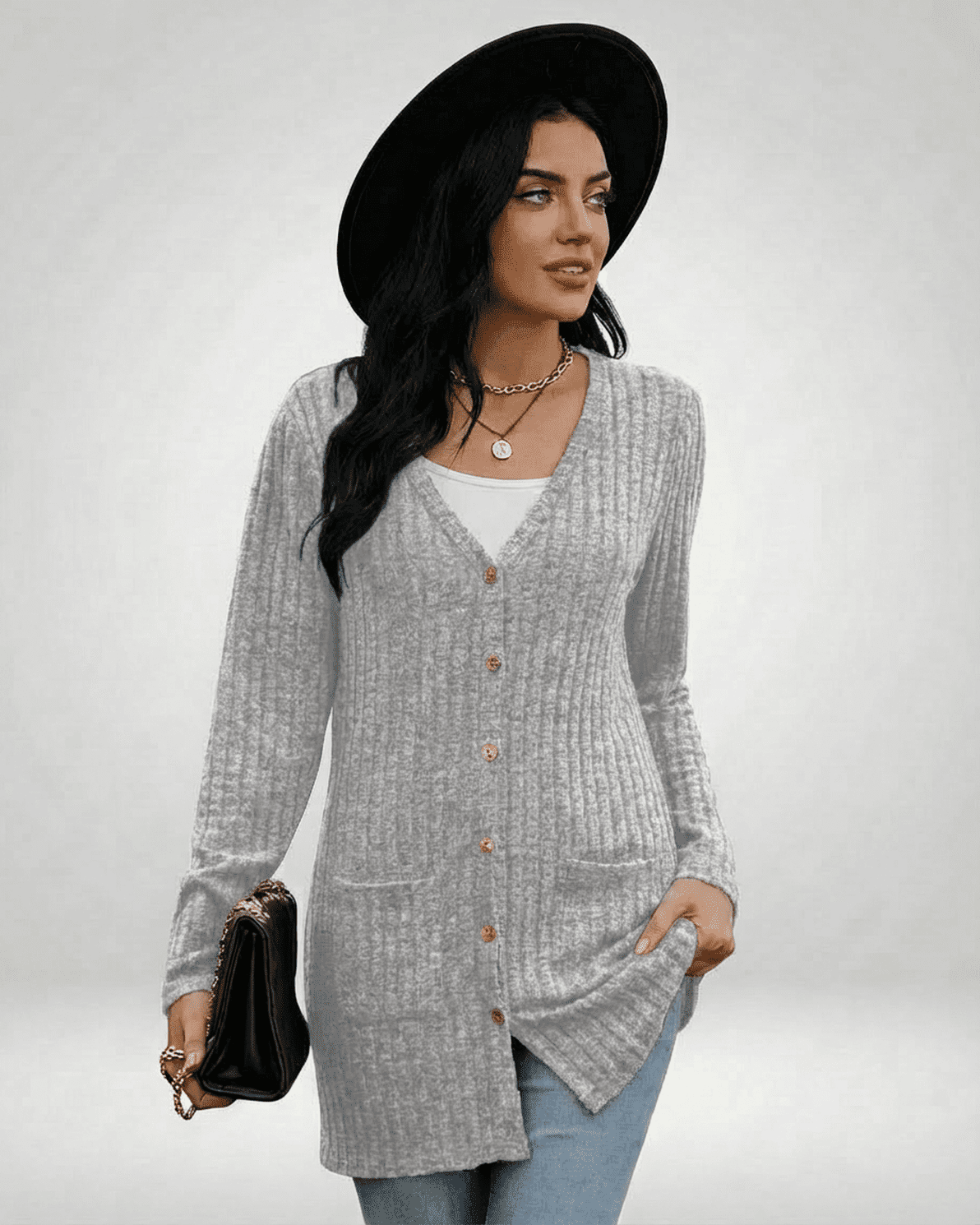 Luna Cardigan by Slimona, longline button-front knitwear in grey featuring a V-neckline and ribbed texture.