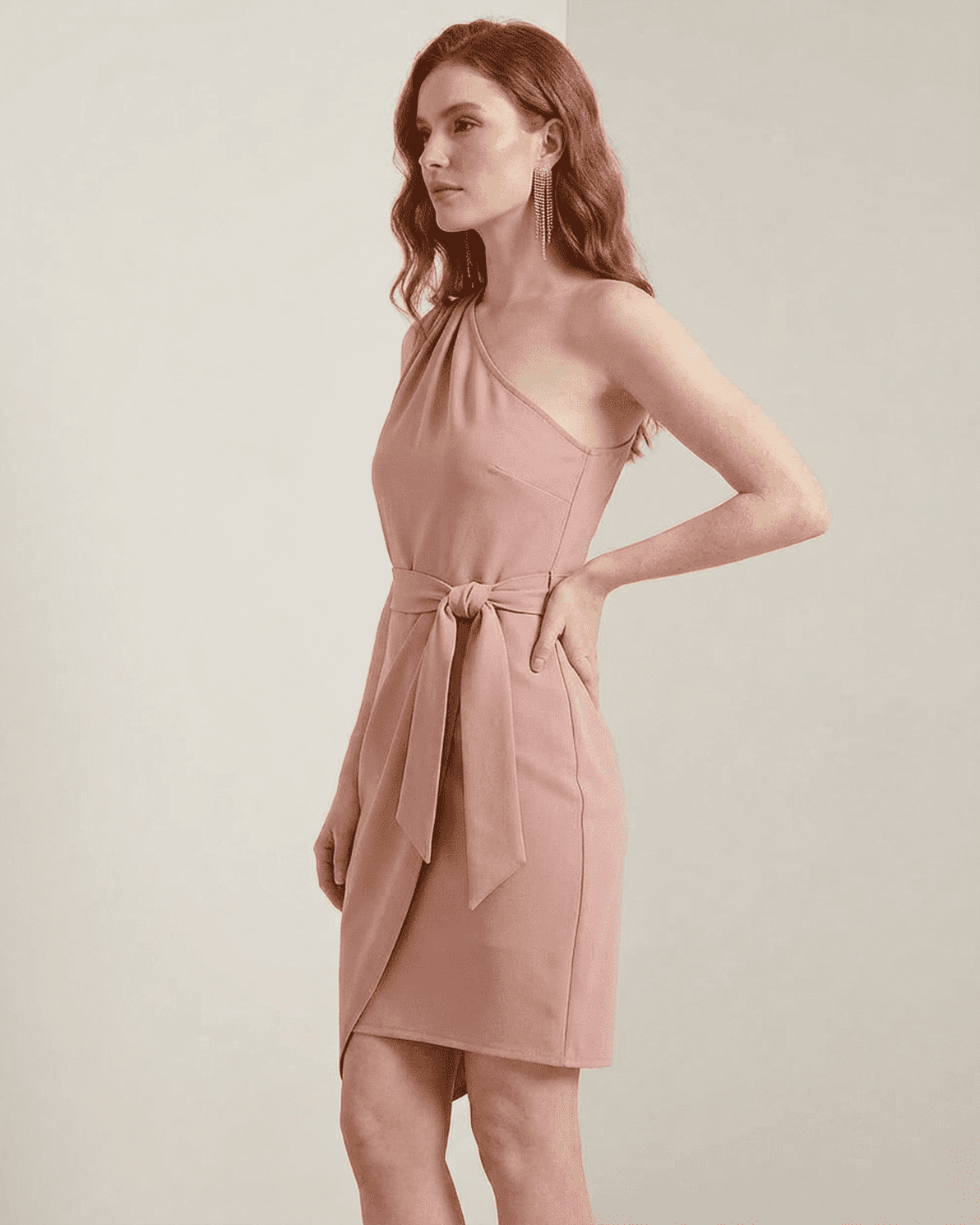 Slimona Lyra Mini Dress in pink, one-shoulder satin bodycon with an asymmetrical hem and tied waist detail.