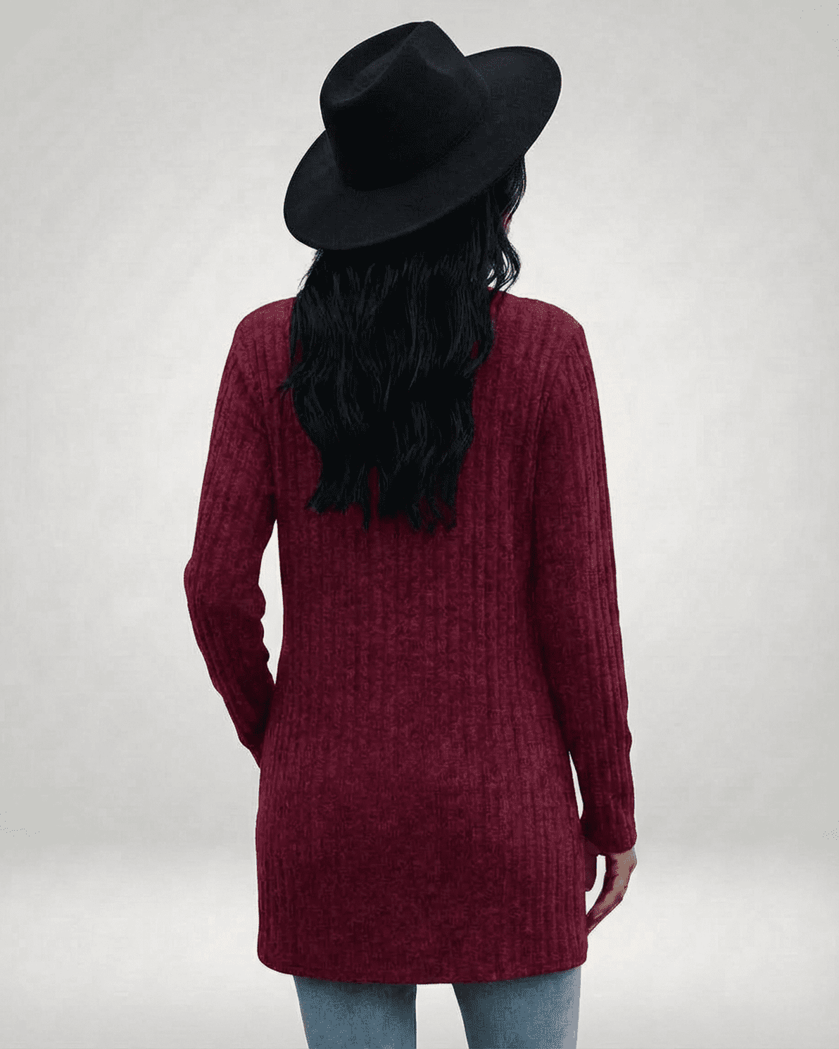 Back view of a woman wearing the Merlot Cardigan by Slimona, styled with a black hat, showcasing its longline silhouette.