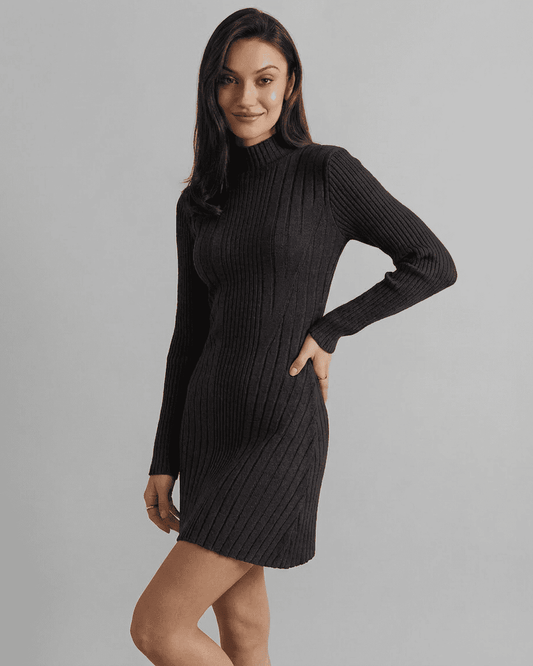 Model showcasing the Milano Mini Dress by Slimona, featuring a ribbed knit, mock neck, and long sleeves.