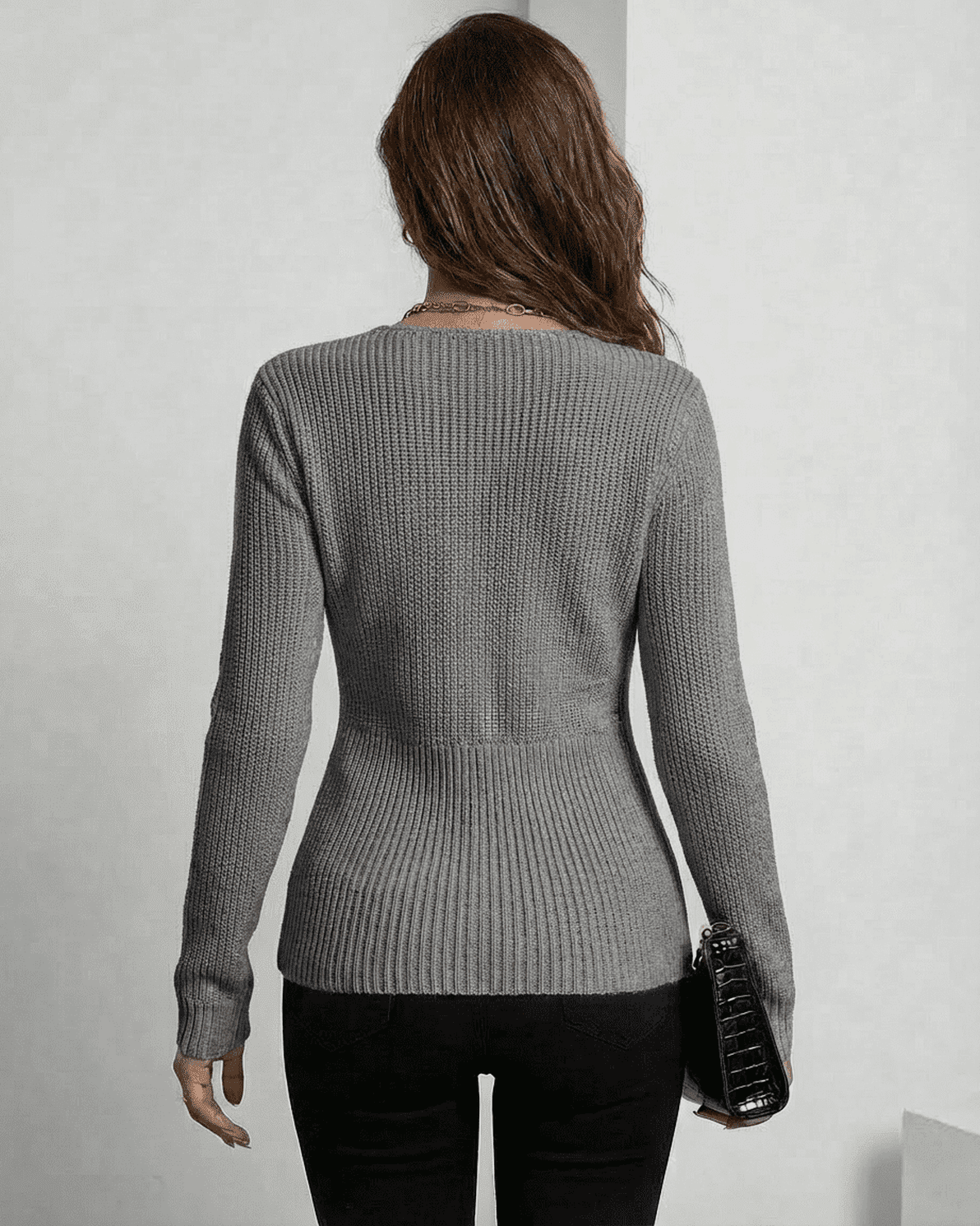 Nerina Pullover in elegant grey showcasing a refined ribbed slim fit from the back by Slimona.