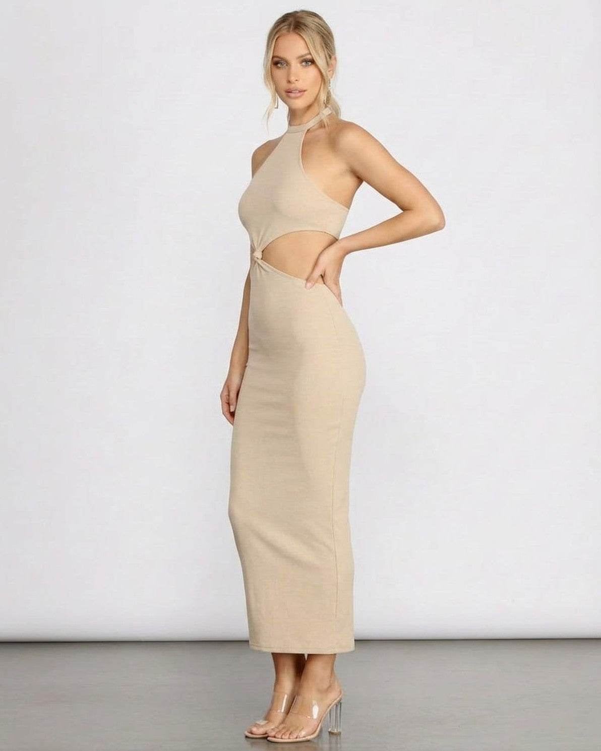 Slimona Nina Midi Dress featuring a chic halter neckline and cutout details, perfect for summer elegance.