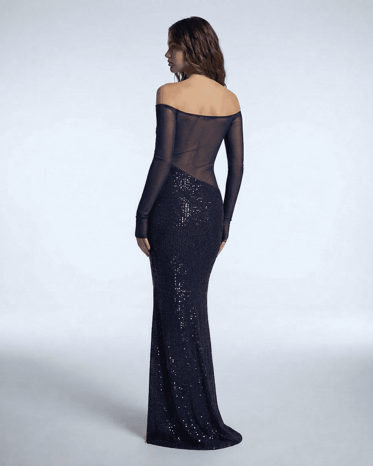 Back view of the Noctura Maxi Dress by Slimona, showcasing its elegant sequin design and sheer mesh detailing.