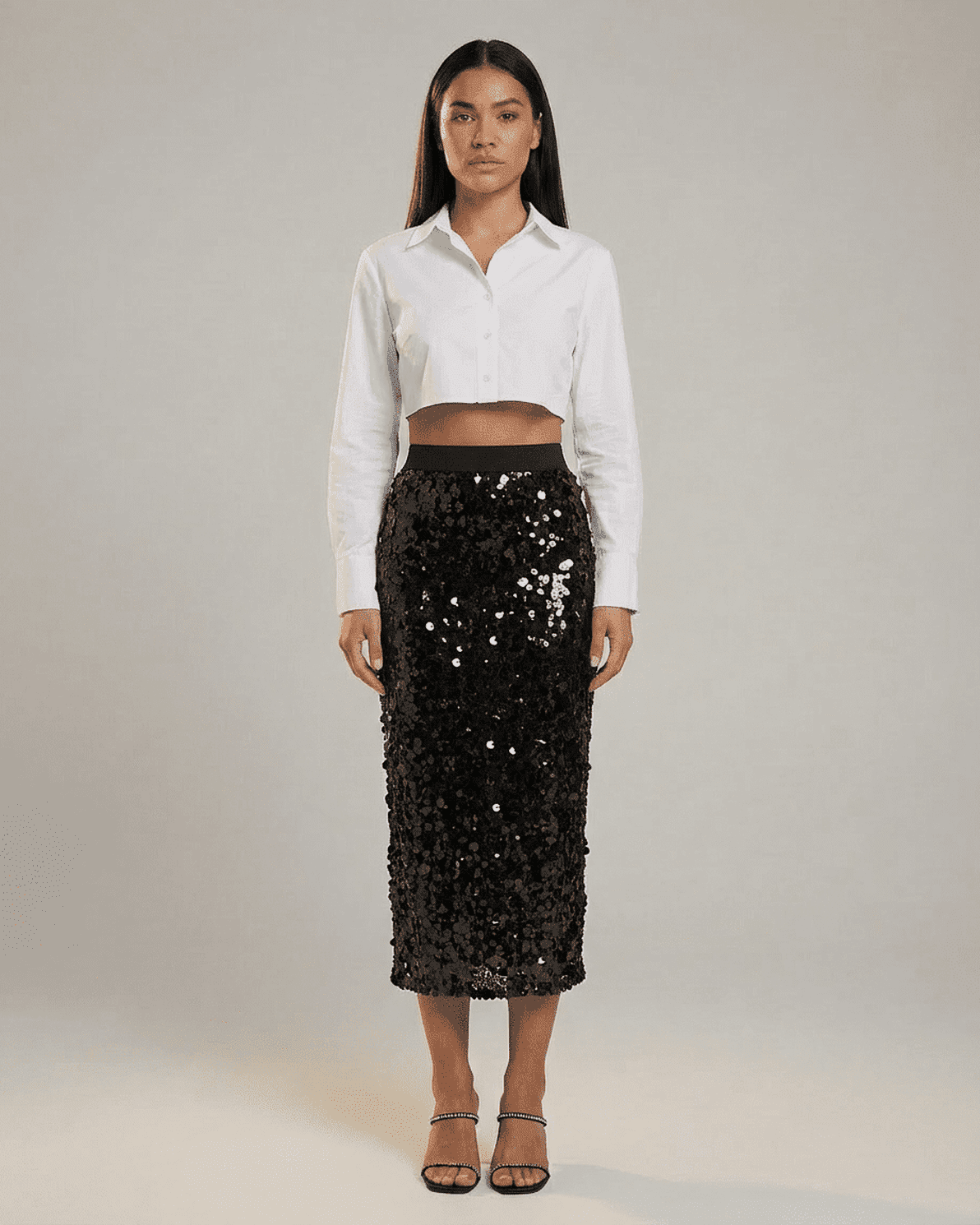 Noctura Midi Skirt by Slimona – Sequin high waist bodycon midi skirt styled for an elegant evening look.