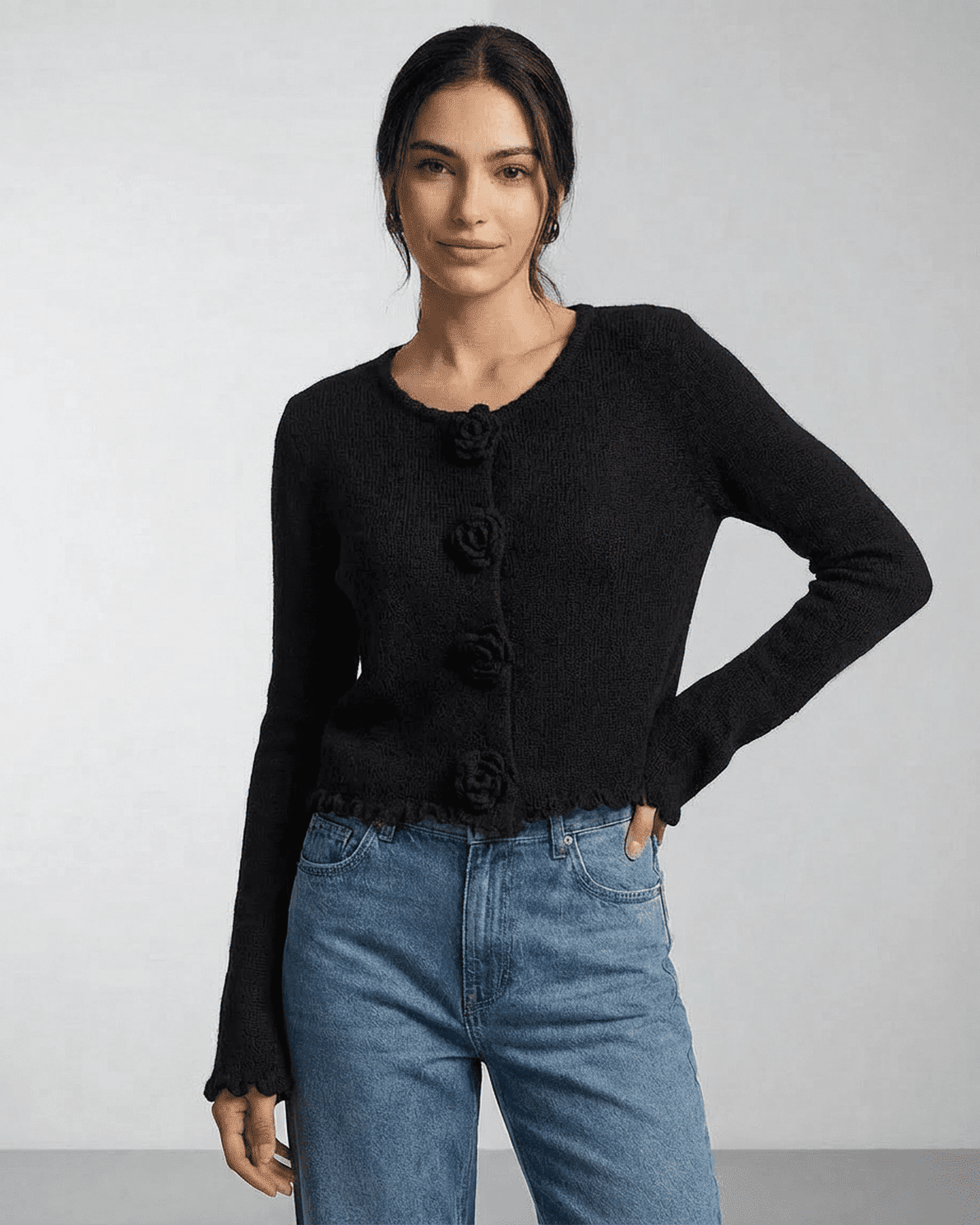 Noir Cardigan by Slimona — Floral button knit cardigan in black with a modern silhouette.