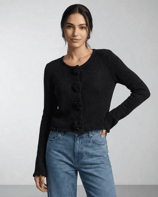 Noir Cardigan by Slimona — Floral button knit cardigan in black with a modern silhouette.