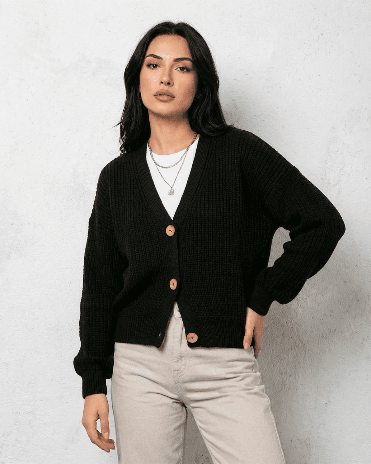 Noir Cardigan by Slimona - Sleek black knitwear with classic V-neck and button detail, perfect for stylish layering.