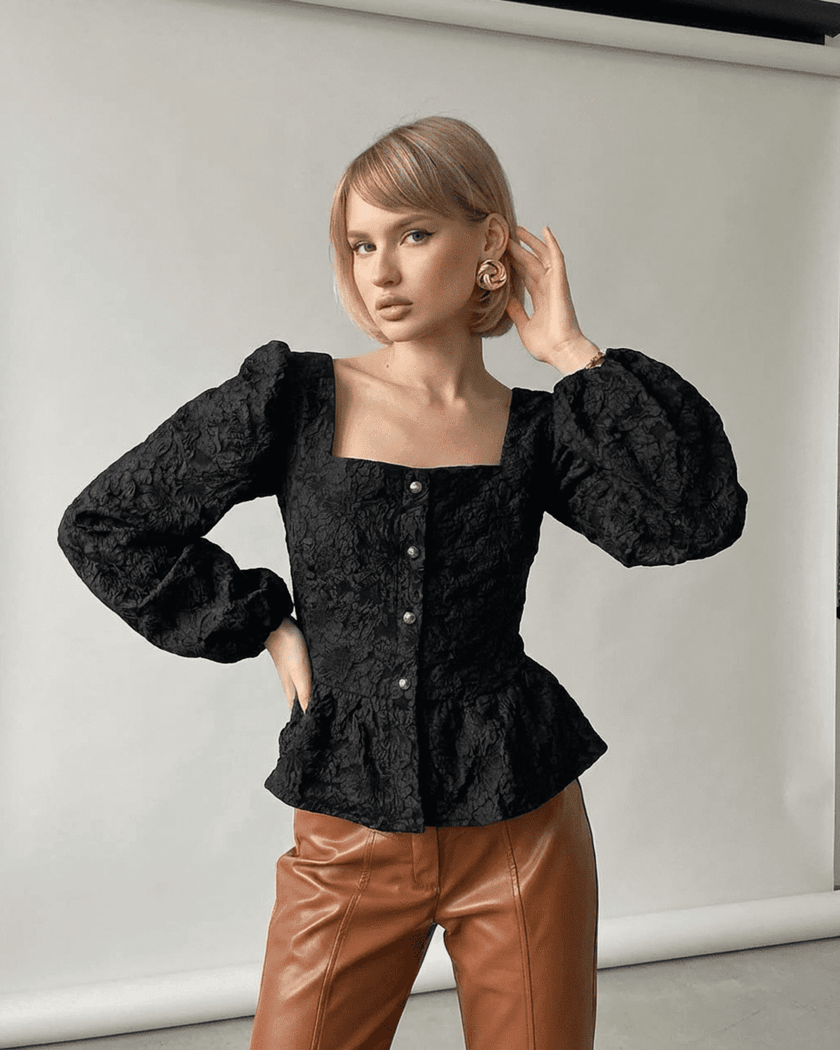 Noir Corset Top by Slimona, elegant black jacquard blouse with square neckline and puff sleeves.
