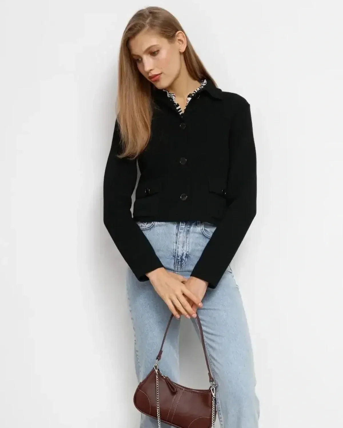 Noir Jacket by Slimona, a cropped black women's jacket featuring button closure and stylish design.