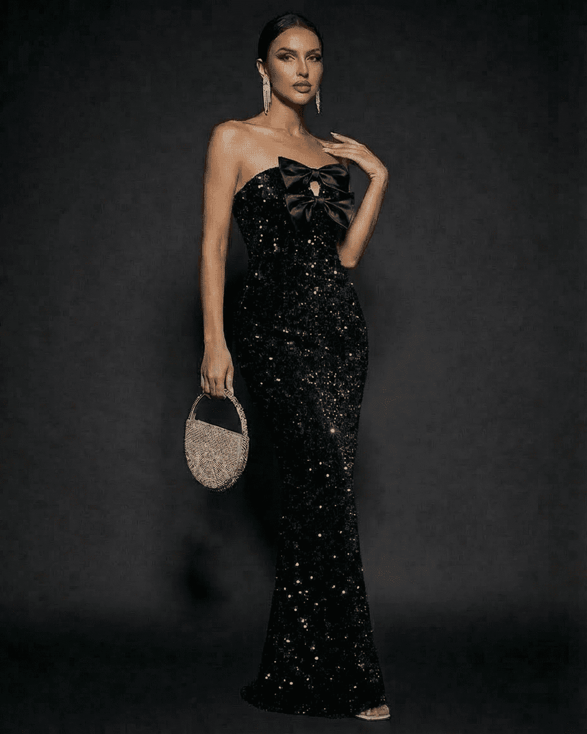 Elegant Noir Maxi Dress by Slimona, featuring sequins and satin bows, perfect for formal occasions.
