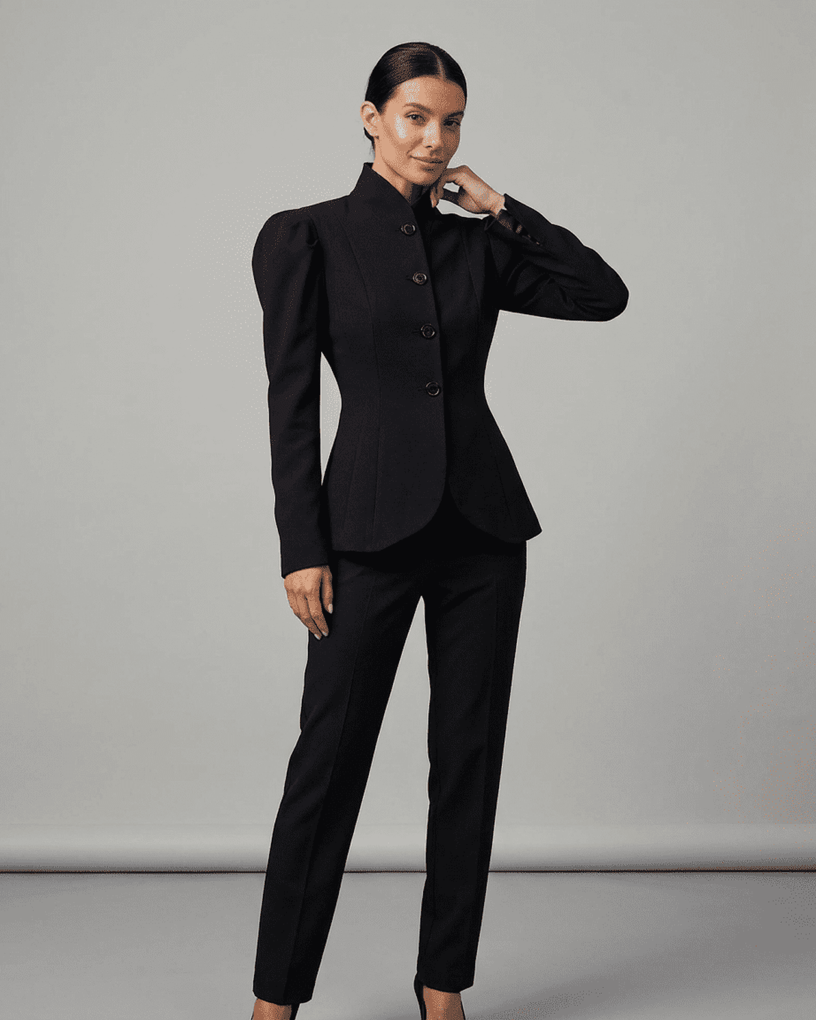 Noiré Blazer by Slimona with stand collar and puff sleeves in elegant black tailored design.