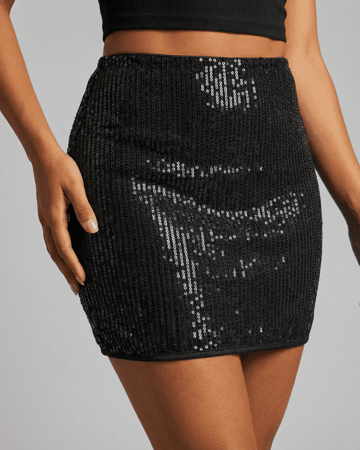 Noiré Mini Skirt by Slimona – Sequin high waist bodycon mini skirt showcasing a sculpting fit and refined shine.