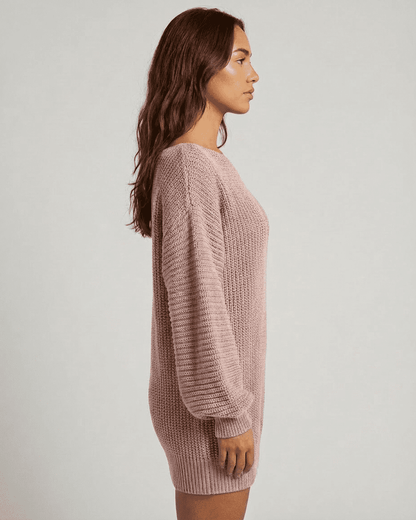 Nova Mini Dress by Slimona in soft pink ribbed knit showcasing an off-the-shoulder design and lantern sleeves.
