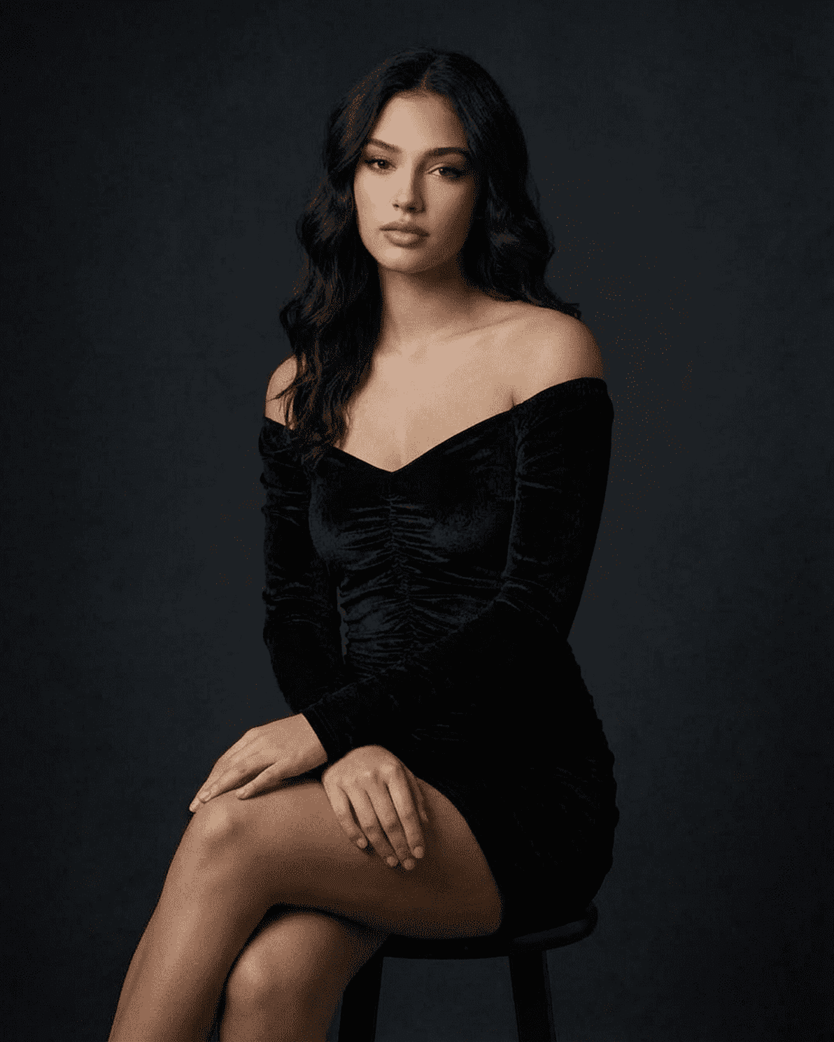 Nova Mini Dress by Slimona, featuring a ruched velvet design and elegant deep V-neckline.