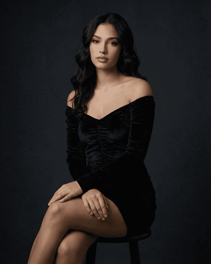 Nova Mini Dress by Slimona, featuring a ruched velvet design and elegant deep V-neckline.