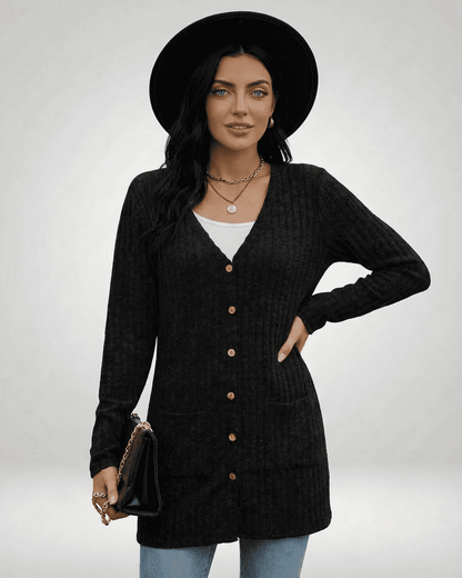 Model wearing Nyx Cardigan by Slimona, featuring a longline silhouette and button-front design.