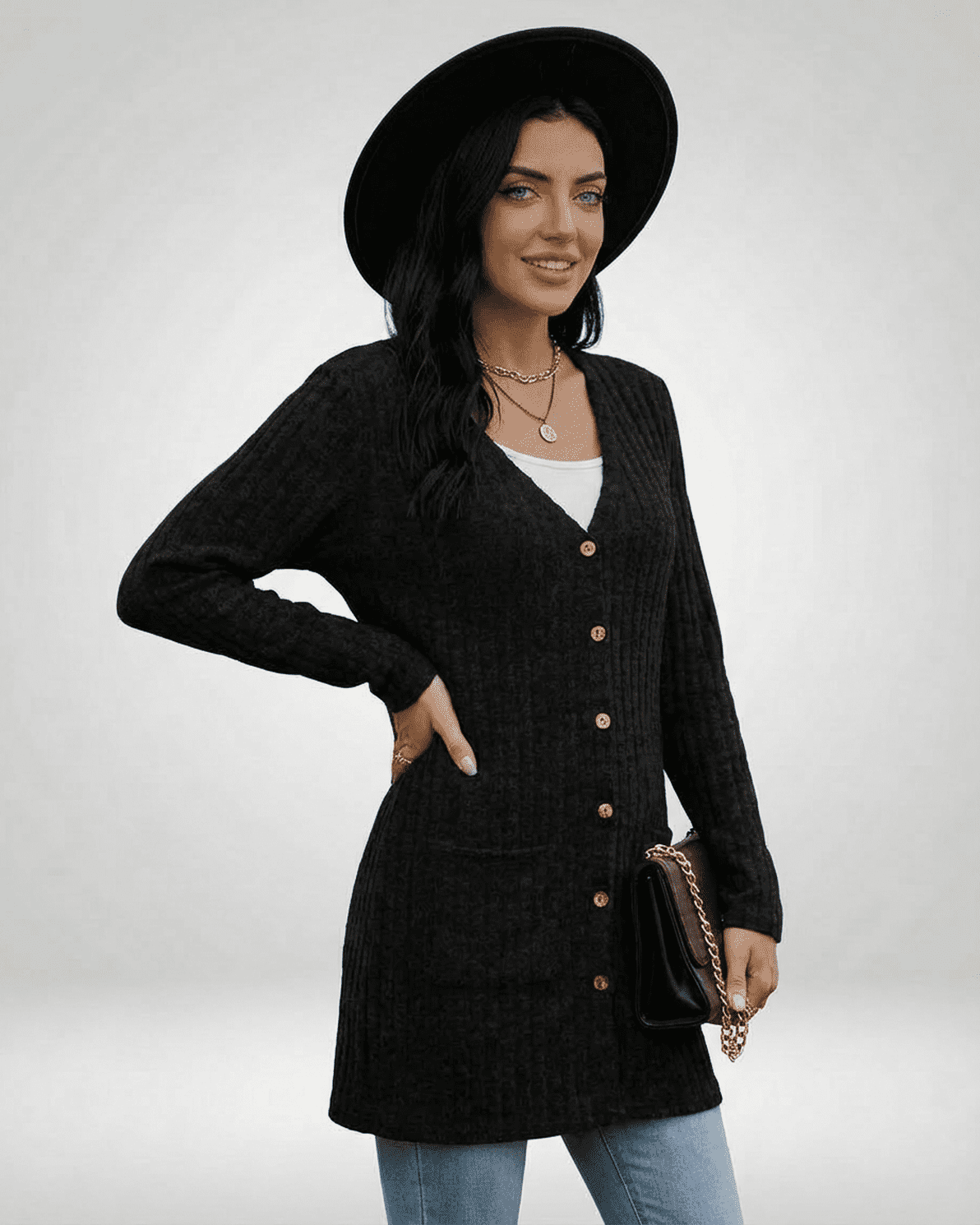 Model wearing the Nyx Cardigan by Slimona, showcasing a longline silhouette and button-front design.