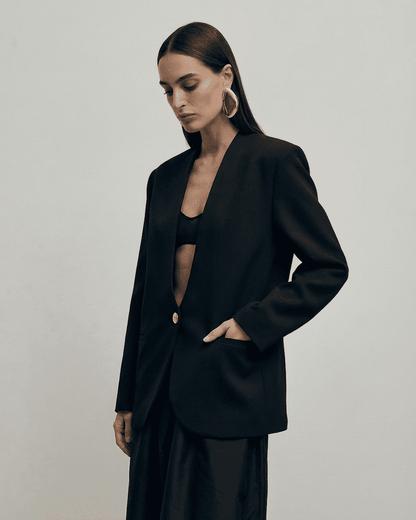 Obsidia Blazer by Slimona, fitted black women's blazer featuring a V-neck and tailored silhouette.