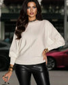 Elegant women wearing Pearl Pullover by Slimona, featuring a soft white knit design perfect for fall and winter.