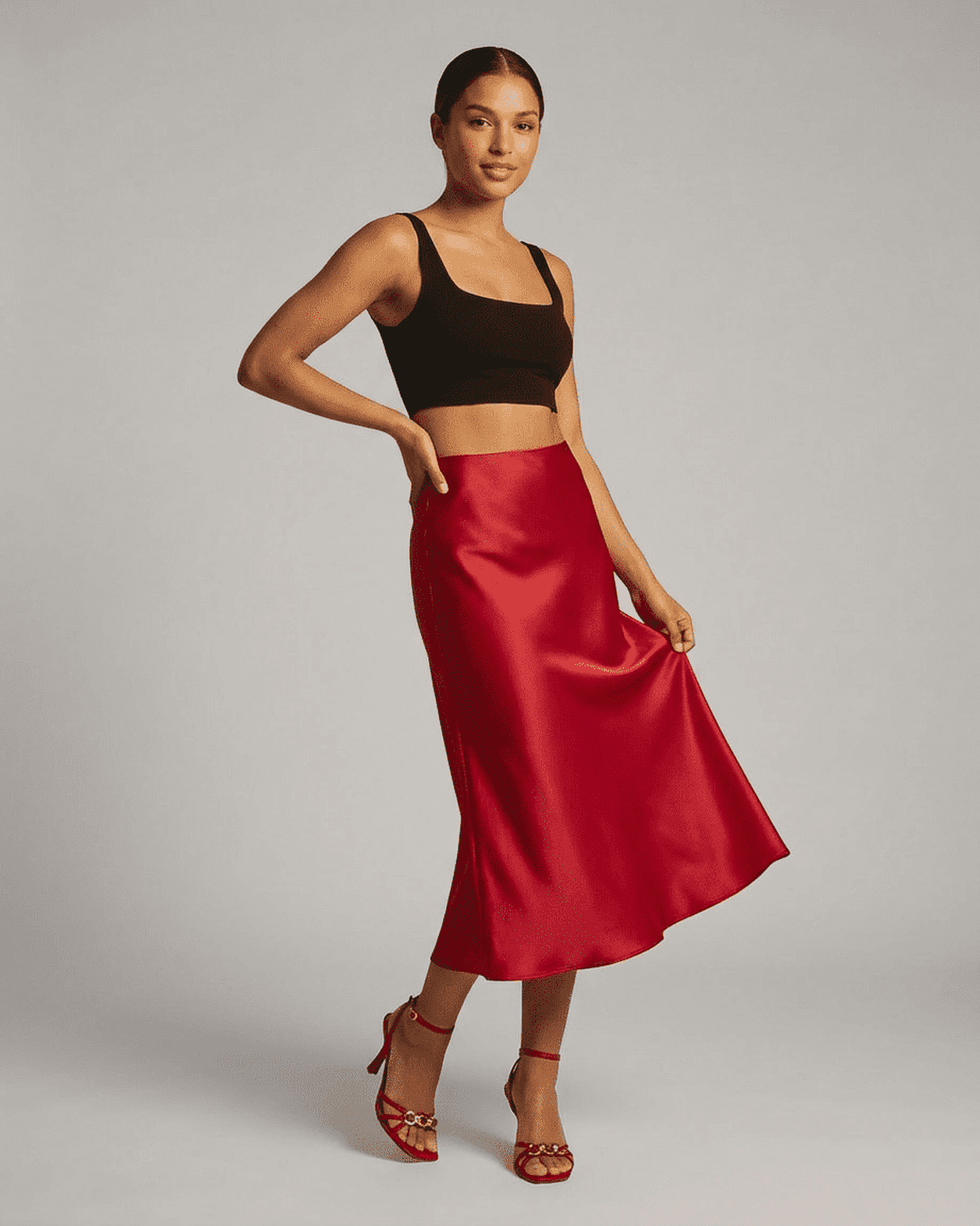Rosalia Midi Skirt by Slimona showcasing a satin mermaid design in red for an elegant look.