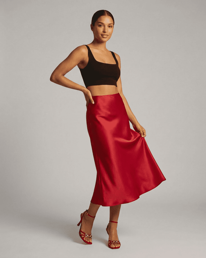 Rosalia Midi Skirt by Slimona showcasing a satin mermaid design in red for an elegant look.