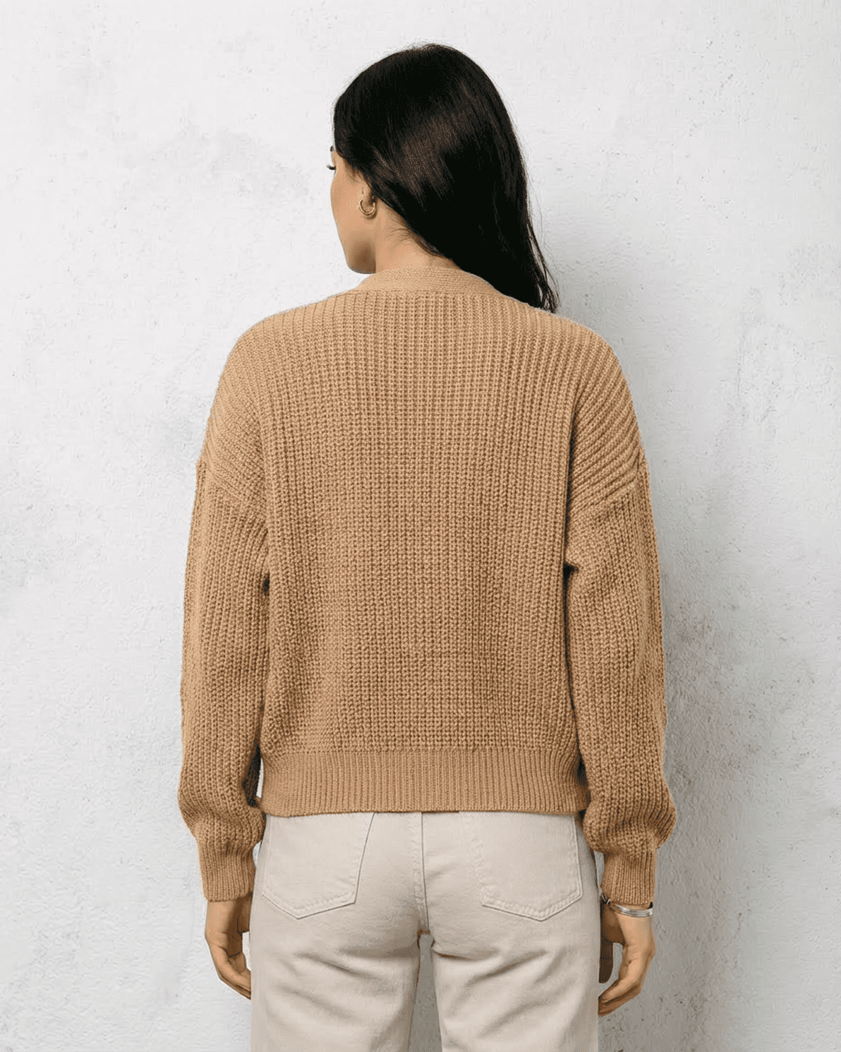 Back view of the Saffron Cardigan by Slimona, showcasing its relaxed fit and stylish knit texture.