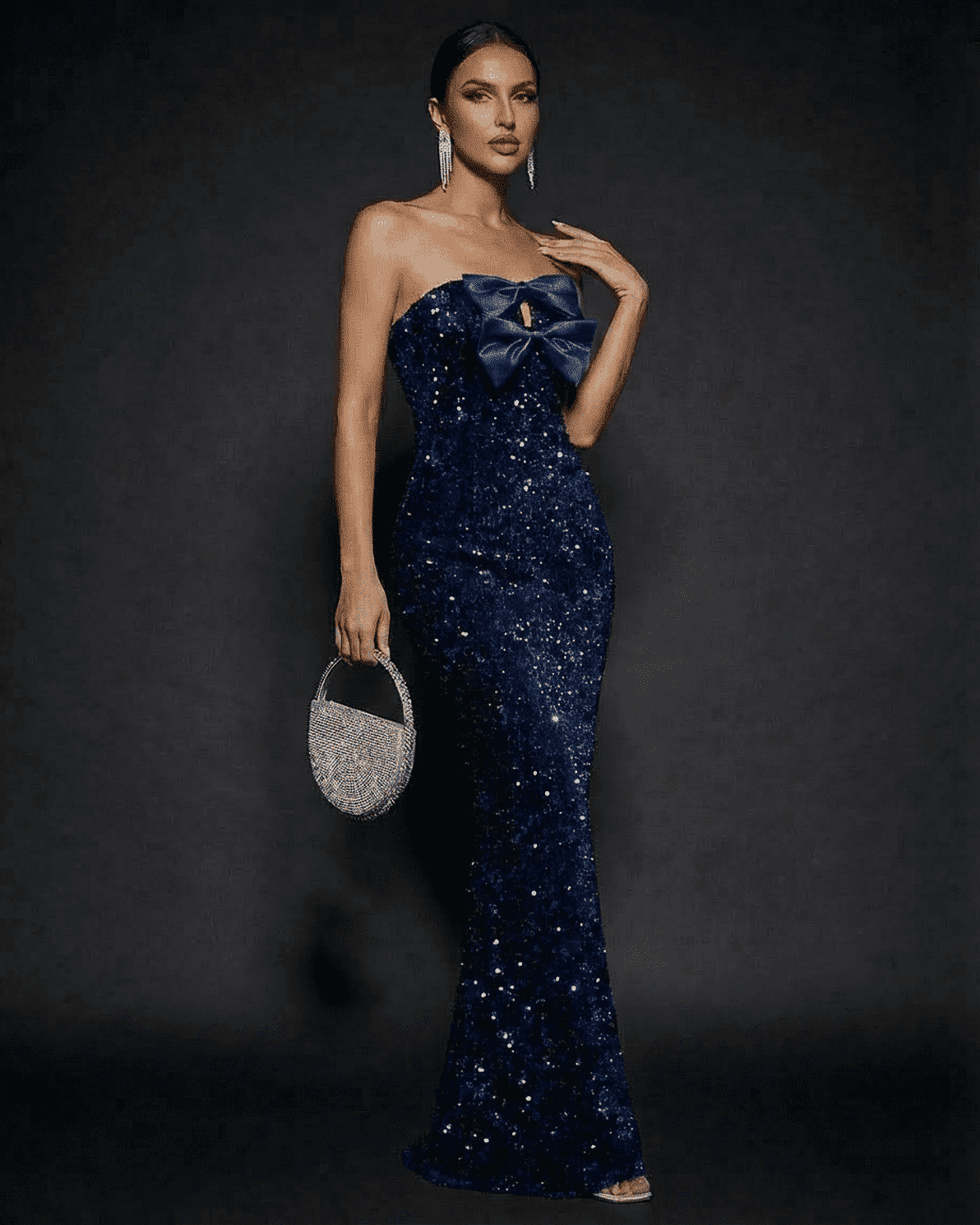 Slimona Sapphire Maxi Dress featuring strapless design and stunning bow, perfect for elegant party occasions.