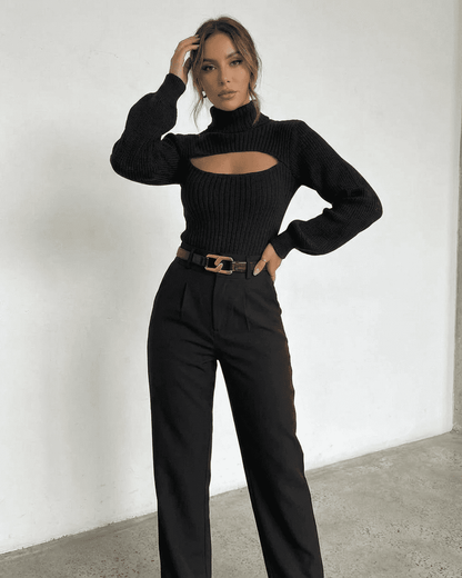 Sarina Sweater by Slimona - Chic black mock neck sweater with hollow out design styled with high-waisted pants.