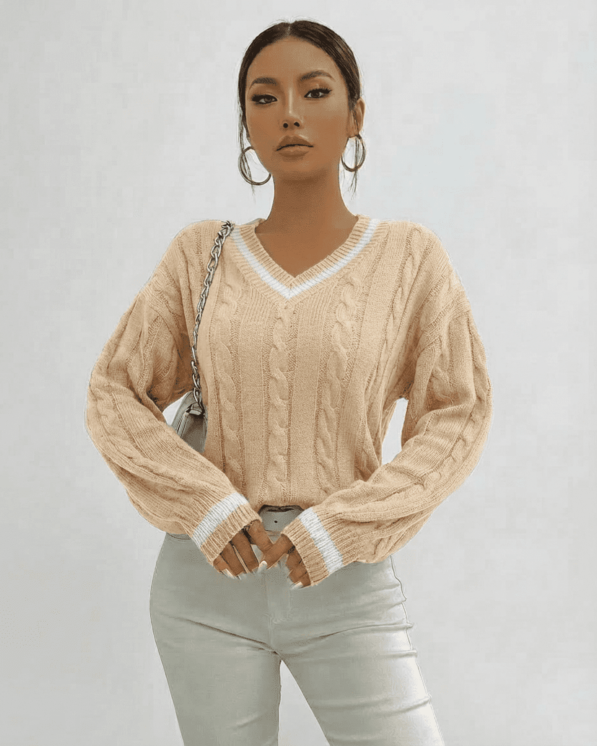 Savona Sweater by Slimona in cable knit design with V-neck silhouette, perfect for fall and winter wardrobes.