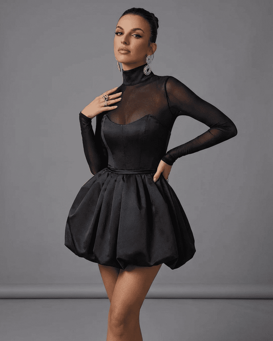 Selene Mini Dress by Slimona featuring a bubble hem and sheer mesh upper, epitomizing elegance and modern style.