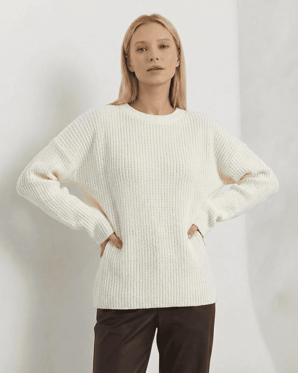 Seren Sweater by Slimona in ivory, showcasing loose fit thick ribbed knitwear with round neck.