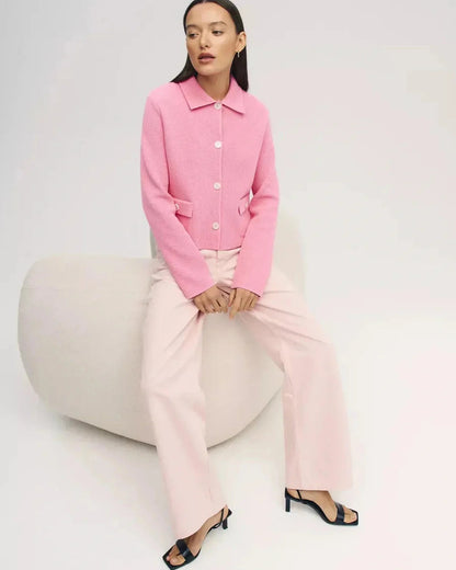 Serena Jacket by Slimona showcasing a cropped pink women's jacket with button closure for a stylish look.
