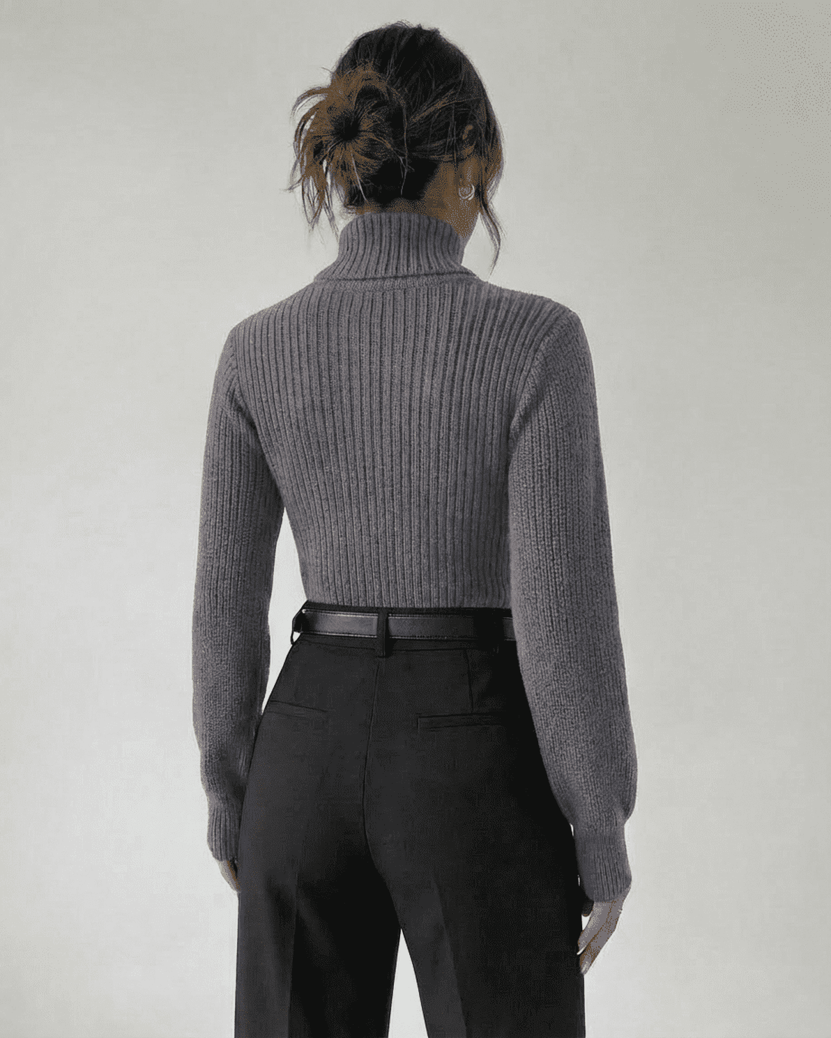 Slate Sweater by Slimona shown from the back, featuring a structured mock neck and ribbed knit design.