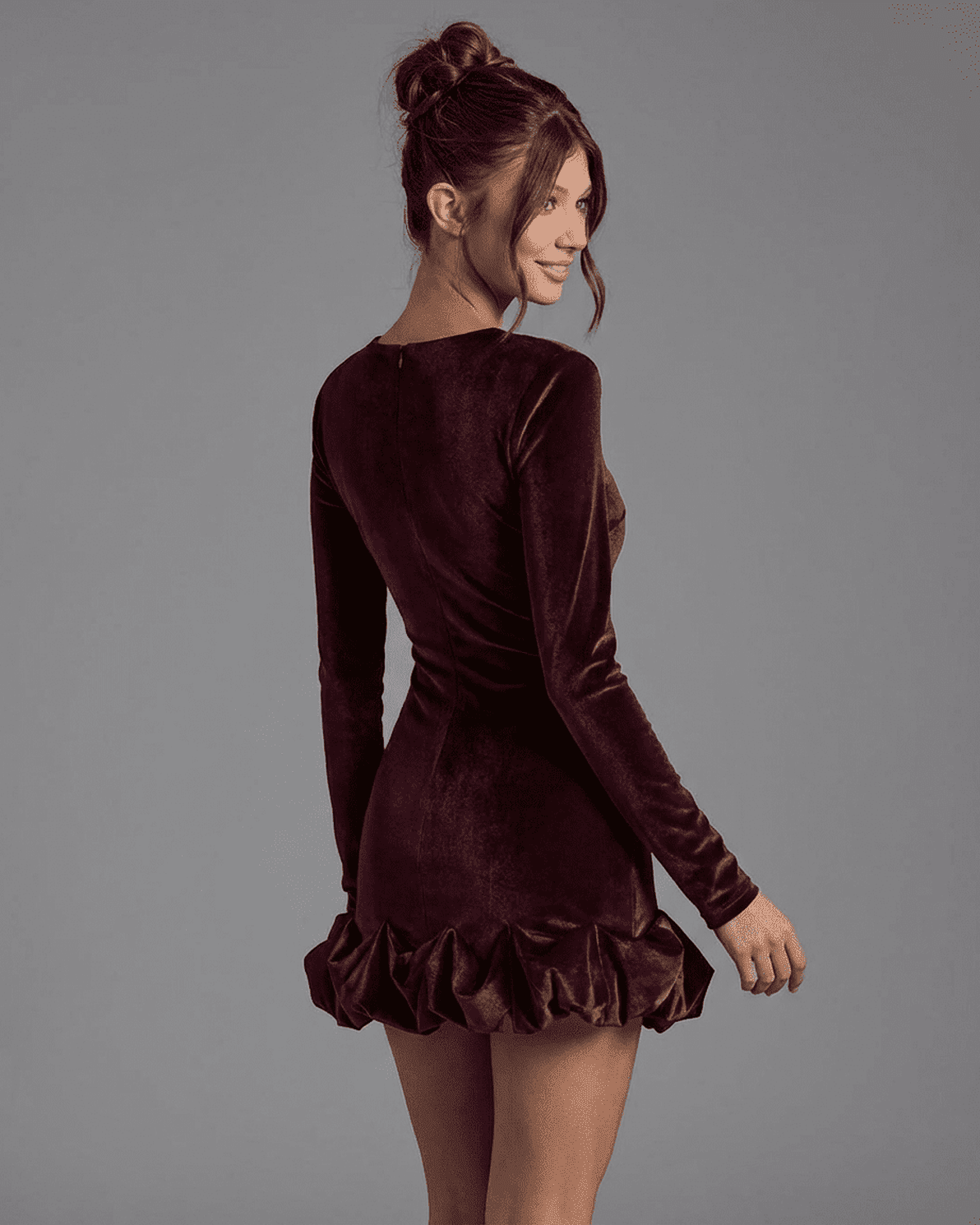 Velora Mini Dress by Slimona, showcasing deep burgundy velvet fabric and a pleated hem design.