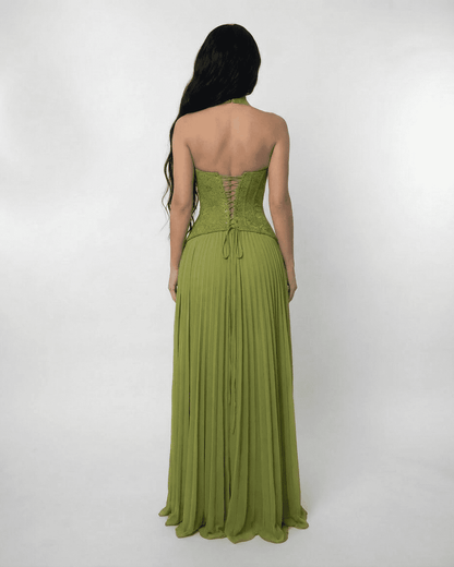 Back view of the Slimona Verdant Maxi Dress featuring a lace bodice and a pleated flowing skirt in olive green.