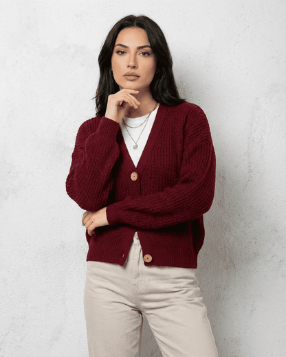 Vesper Cardigan by Slimona in a luxurious burgundy color, featuring a classic V-neck design and a loose fit.